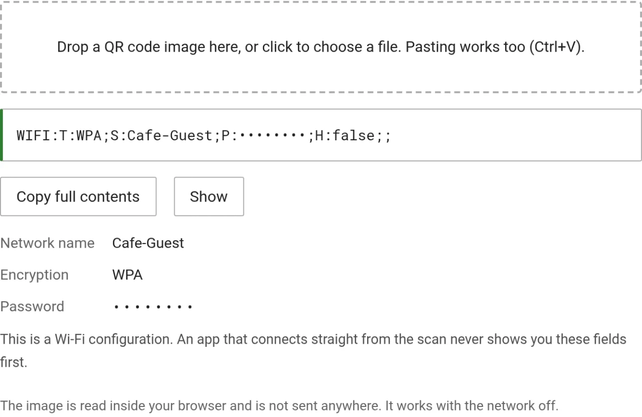 The QR code reader decoding a set of Wi-Fi credentials, with the fields broken out into network name, encryption and password, the password masked with dots